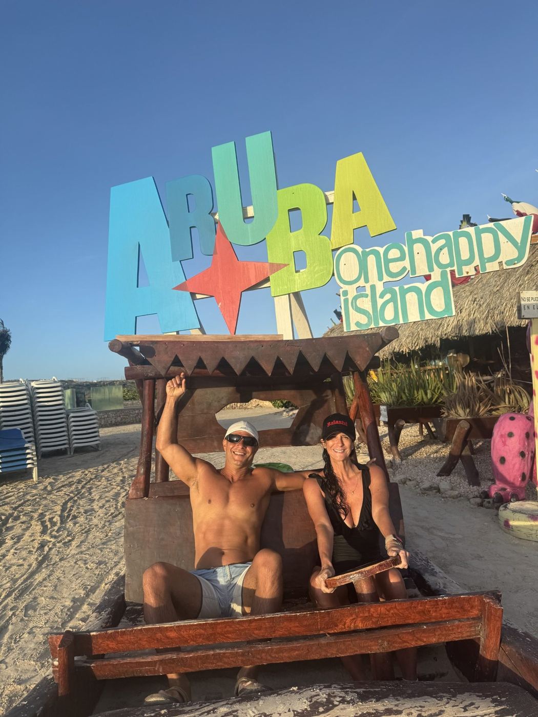 Rob and Nadine at the ARUBA One happy island sign in Palm Beach