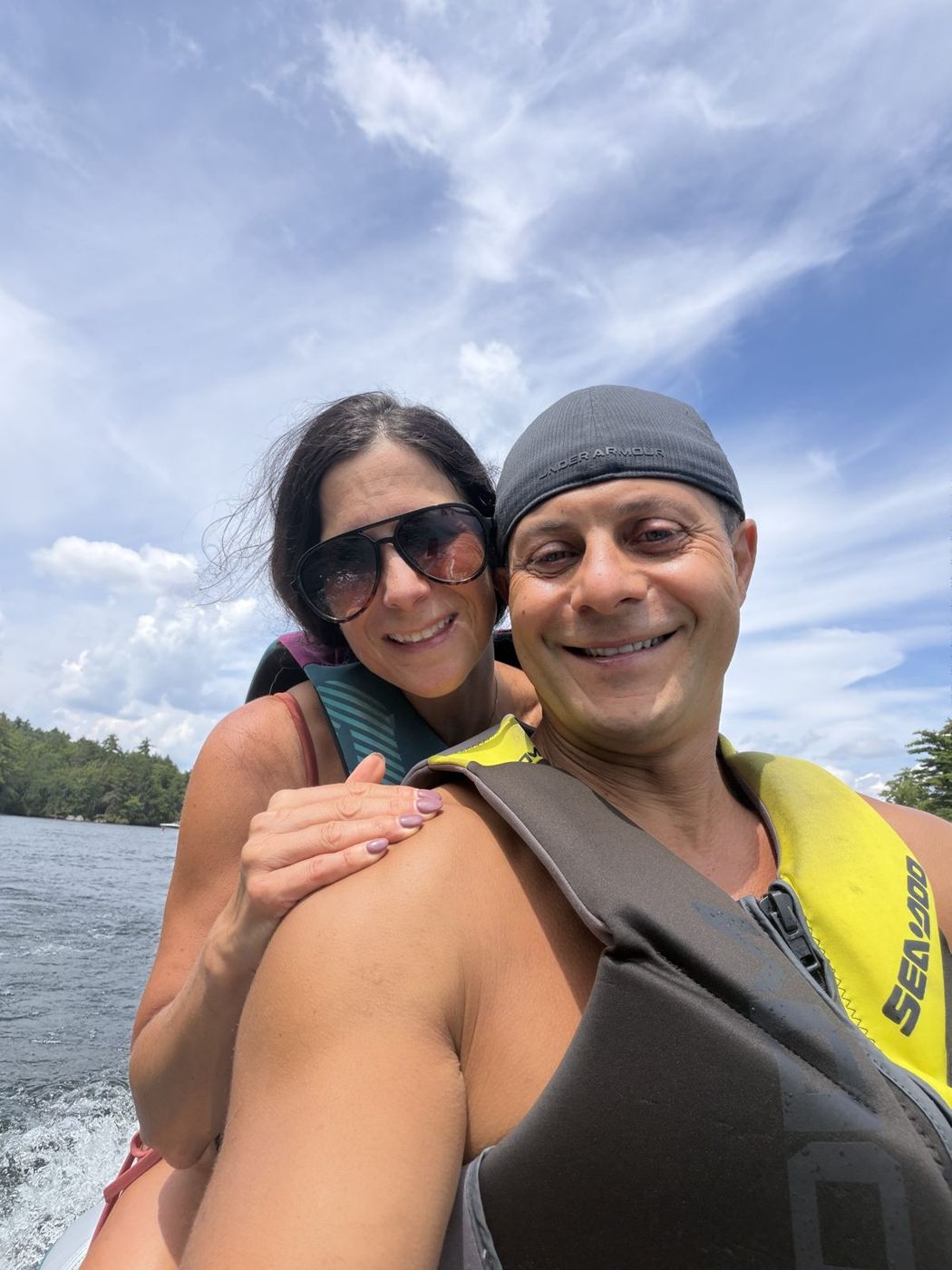 Rob and Nadine on a jet ski on the lake