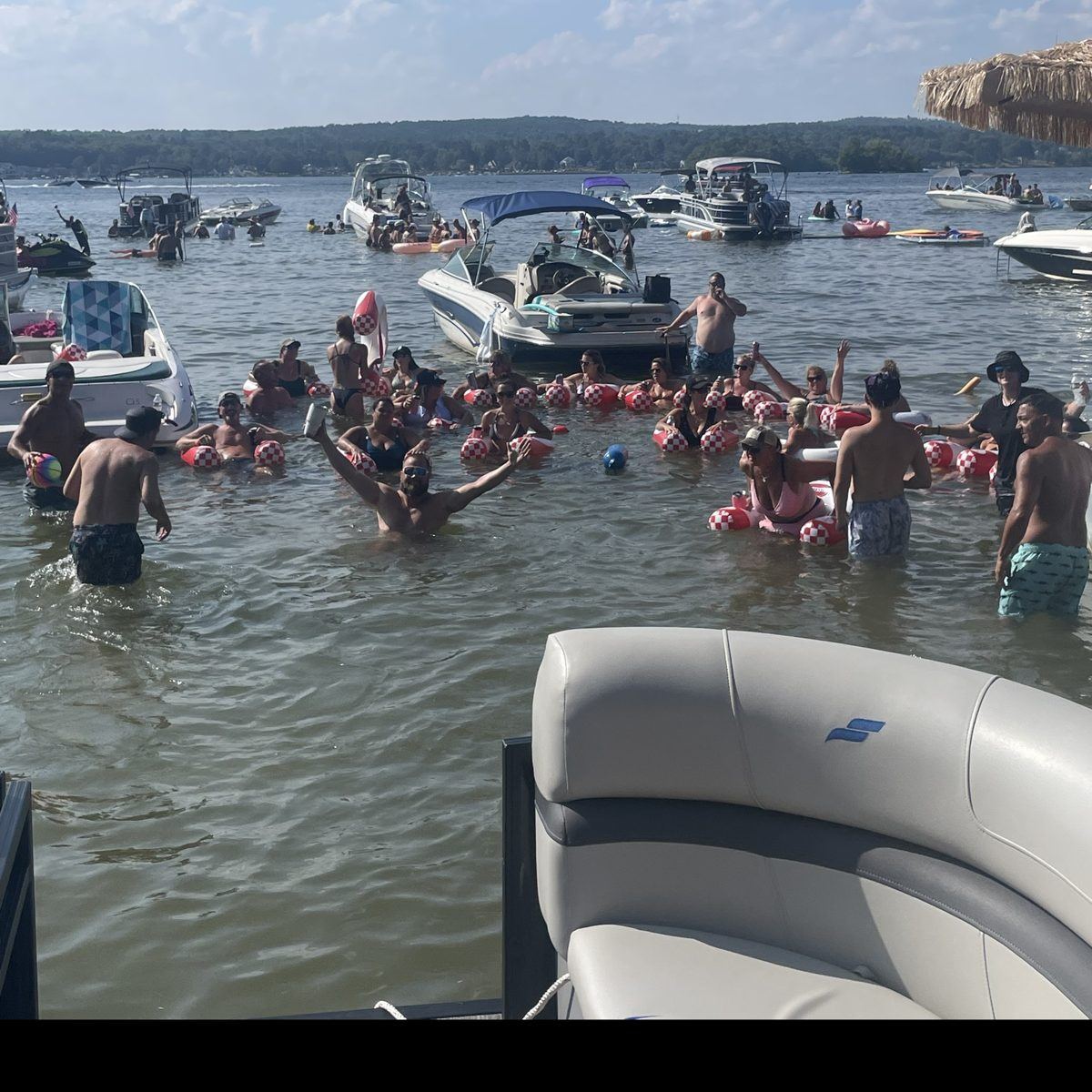 Rob and friends floating together at the sand bar on Lake Winnipesaukee